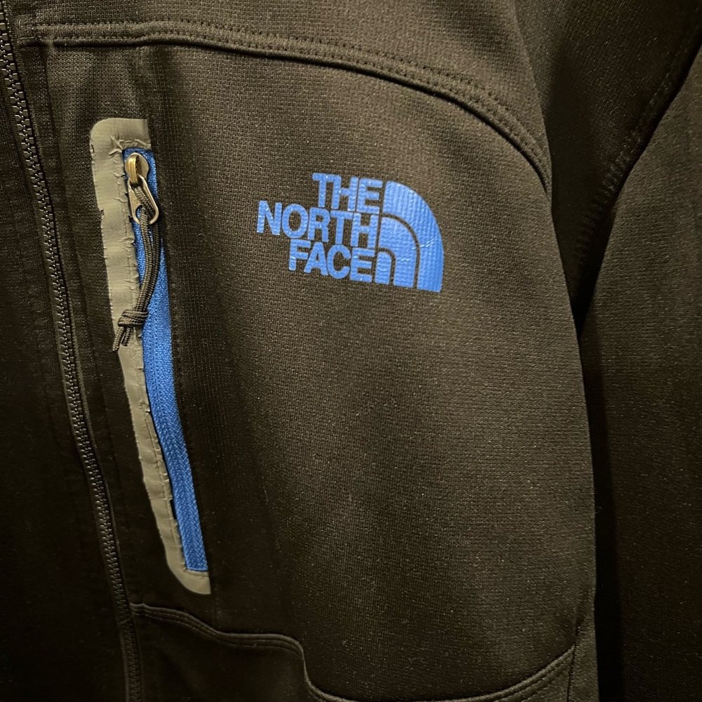 The North Face Men's Black Performance Jacket with Blue Accents - Picture 7 of 8